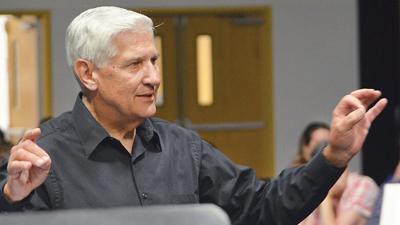 Joe Pappas conducts the Missouri Big Band at Festus High School in May 2018.