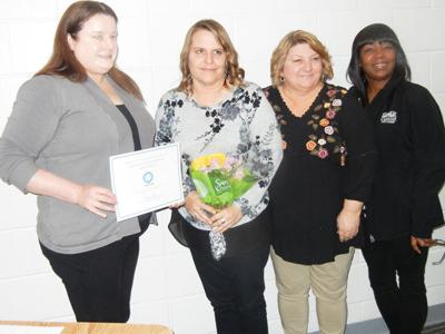 Herculaneum city clerk Lauri Ferretti recently was honored at Board of Aldermen meeting.