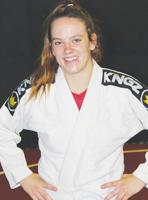 Woman on fire: Jiujitsu champion honors mother through competition