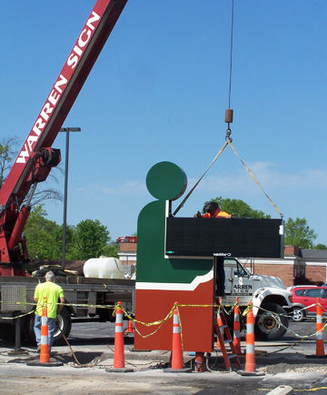 sign being installed at Festus Library