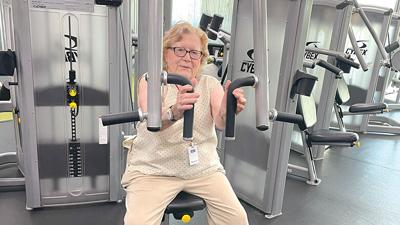 Lorraine Acre, 97, works out at Iron Integrity gym in De Soto three mornings a week.