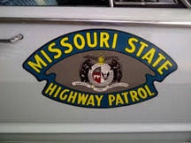 highway patrol patch on car