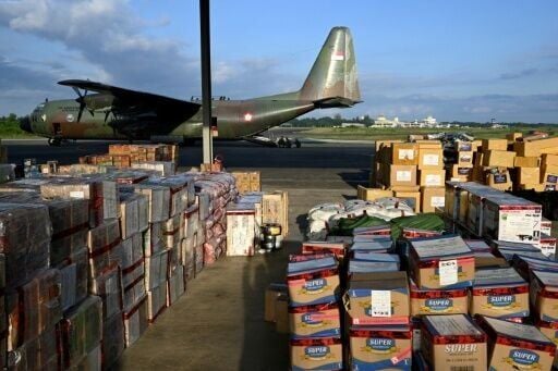 Supplies to be delivered to areas affected by flooding are seen at an Indonesian Air Force base in Sultan Iskandar Muda