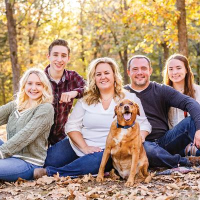 LeAnna Obermeyer, center, is now a full-time real estate agent after decades of buying and selling houses.