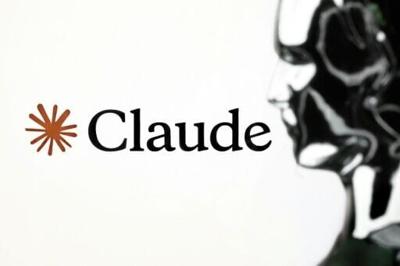 A figurine in front of the logo of the AI assistant "Claude" seen in Paris in February