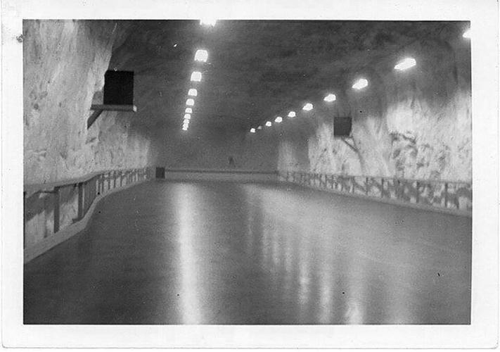 The back chamber of the cave holds a 200-foot-long concrete rink surface.