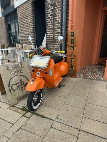 Parking ticket issued to restaurants decorative bike mascot