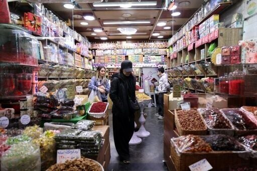 Despite the airstrikes, Tehran residents shop for groceries on Saturday