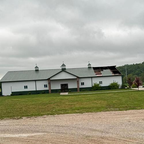 Tornado damages buildings at Brookdale Farms in Eureka