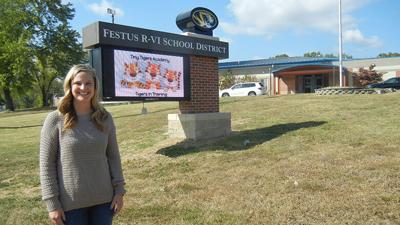 Samantha Mouser, coordinator of the Festus R-6 Early Childhood Education Program, stands outside of the building that will house the program.