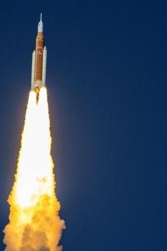 With a thunderous roar, the enormous rocket carried three Americans and one Canadian away from Kennedy Space Center at approximately 6:35 pm