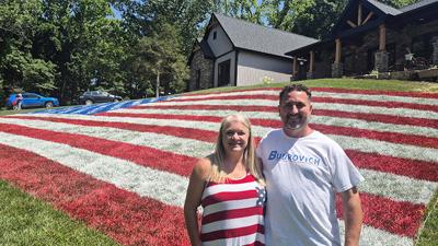 Tony and Nicki Pona painted a 70-by-37-foot American flag outside of their home at 934 Rose Hill Road off Hwy. 61-67 in Imperial to celebrate the 250th anniversary of the United States.