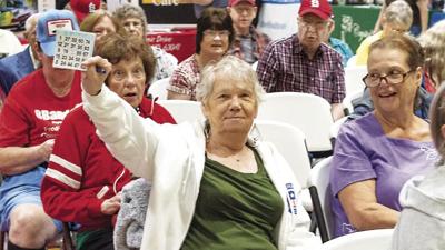 Bingo Envy? (note the looks on the faces of her neighbors). Marilyn Hastings Bingo winner-Orschelns gift card.