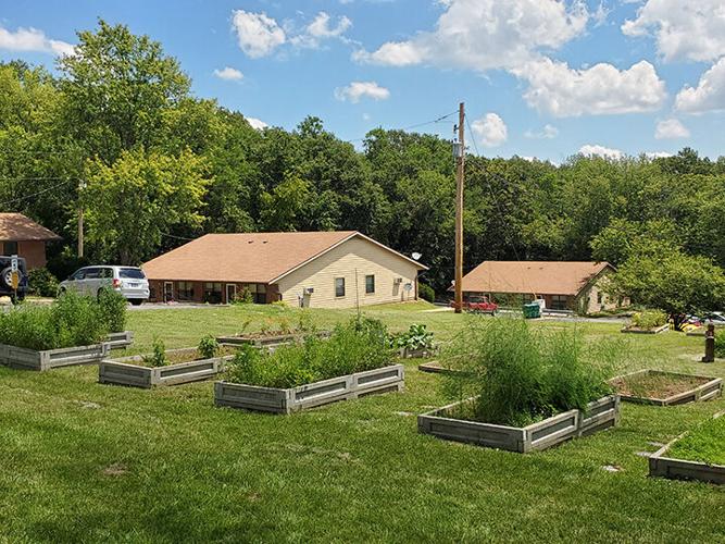 Residents at Jenni’s House will learn skills, such as gardening in the home’s lawn garden.