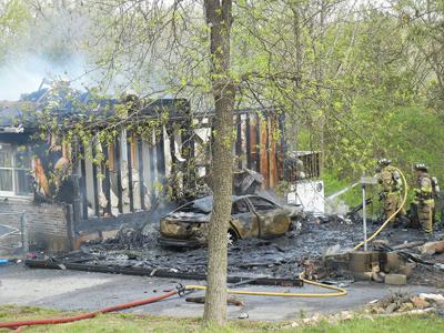 Firefighters battle a blaze on Haverstick School Road southwest of Festus.