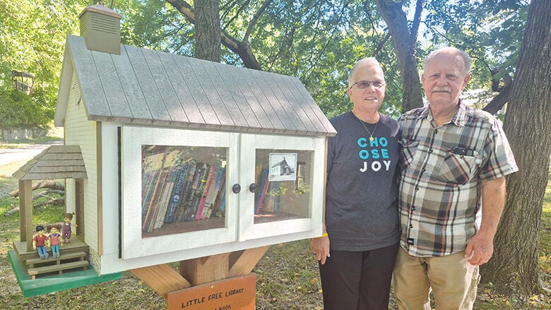 Dan Patterson, who built the free lending library, and his wife, Rita.