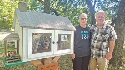 Dan Patterson, who built the free lending library, and his wife, Rita.
