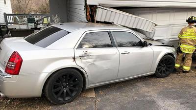 An Imperial man was arrested after he allegedly fled from police and crashed into this Arnold-area garage.