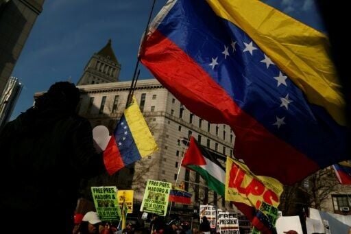 Both backers and opponents of Nicolas Maduro rallied outside the courthouse