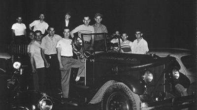 The photo shows the original 12 members of the Herculaneum Fire Department.
