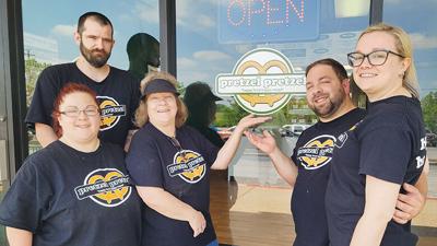 Pretzel Pretzel opened May 7 at 1203 Water Tower Place in Arnold. Pictured, from left, are Amber Meyer, Josh Abernathy, Valerie Meyer, Josh Meyer and Brittany Meyer.