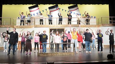 Festus High School students perform the song “Bon Voyage” in a recent rehearsal for the musical “Anything Goes.”
