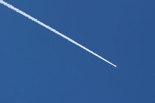 A rocket trail is seen in the sky above the Israeli coastal city of Tel Aviv on March 5, 2026