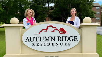 From left are activities director Carla Schlueter and community relations director Marie Stelling.