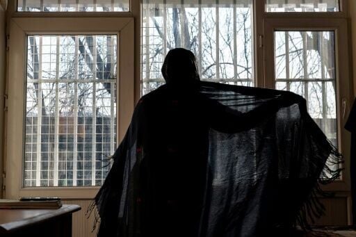 Outside the home, women are forced to cover everything but their hands and eyes