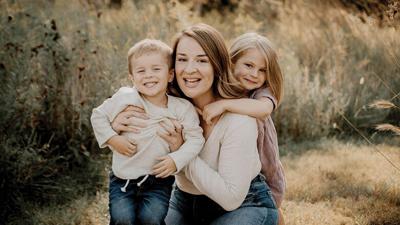 Mary Brasier, center, with her son Hudson and daughter Ella.