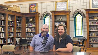 PJ and Elizabeth Arway record episodes for the Heart of Eureka podcast in the library at Most Sacred Heart Catholic Church in Eureka.