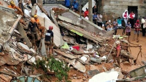 The deluge in the state of Minas Gerais caused a river to burst its banks, prompting flooding, landslides, and building collapses
