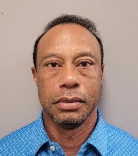 Booking photo of Tiger Woods released by the Martin County (Florida) Sheriff's Office after the golf superstar was arrested on a charge of driving under the influence after a roll-over car crash near his home