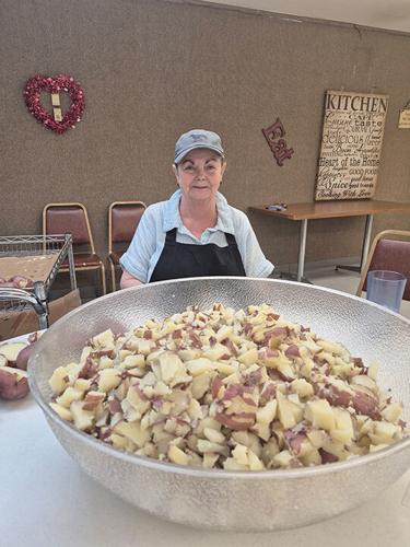 Shirley Schmidt peels potatoes to make potato salad for the Festus American Legion Post 253 fish fry.