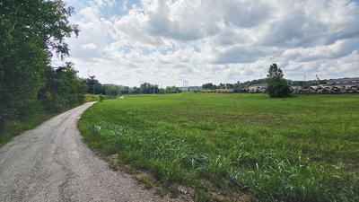 A gravel road leads to the proposed site of a Bitcoin mining facility in Hematite. To the right is the National Guard Armory.