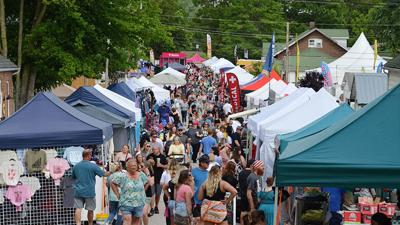 Crowds gather at the 2024 Kimmswick Strawberry Festival.