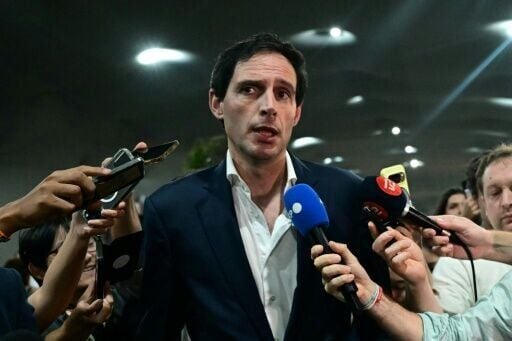 The European Union's climate commissioner, Wopke Hoekstra (C), says the deal on the table at UN climate talks is 'unacceptable'