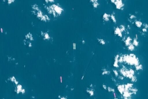 This handout satellite image released by the European Space Agency (ESA) shows two vessels conducting what appears to be an offshore cargo transfer off the southeast coast of the Malay Peninsula near Singapore on April 3