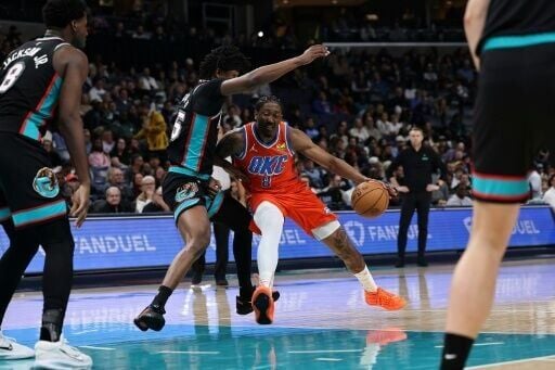 Oklahoma City's Jalen Williams drives against GG Jackson in the Thunder's NBA victory over the Memphis Grizzlies