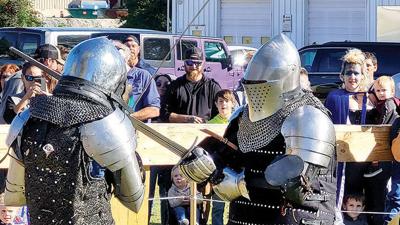 Two knights battle at the 2023 Mead on Main Viking Festival in Festus hosted by Four Brothers Mead.