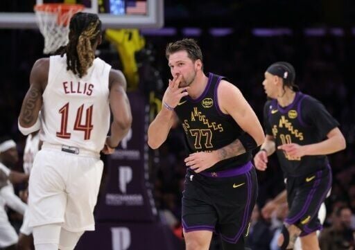 Luka Doncic of the Los Angeles Lakers reacts after making a three-pointer against the Cleveland Cavaliers