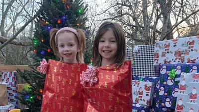 Quinn and Harper Tucker, twin daughters of Kristy Tucker of Festus, were all wrapped up during Christmas at grandma’s house.