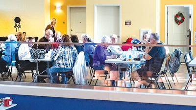 Senior citizens gather for lunch on Jan. 6, 2020, the day the De Soto Senior Center moved to 221 S. Third St. in De Soto.