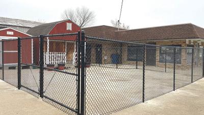With a fence installed in December, work will begin this spring on a community garden behind the De Soto Farmers Market, 520 N. Main St.