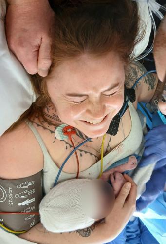 Baby born on Attenborough’s 100th birthday named after environmentalist