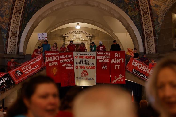 Protesters opposing the construction of artificial intelligence data centers
