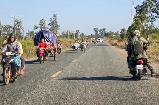 Cambodian residents flee following clashes along the border with Thailand