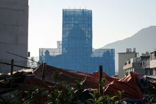 The Yayang church is seen covered in scaffolding in Yayang township, Wenzhou city, in eastern China's Zhejiang province on January 9, 2026