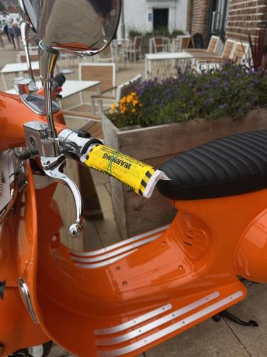 Parking ticket issued to restaurants decorative bike mascot