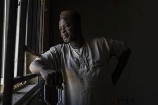 Nigerian chief Umar Bio Salihu says attackers killed scores of people and torched homes and businesses in his village